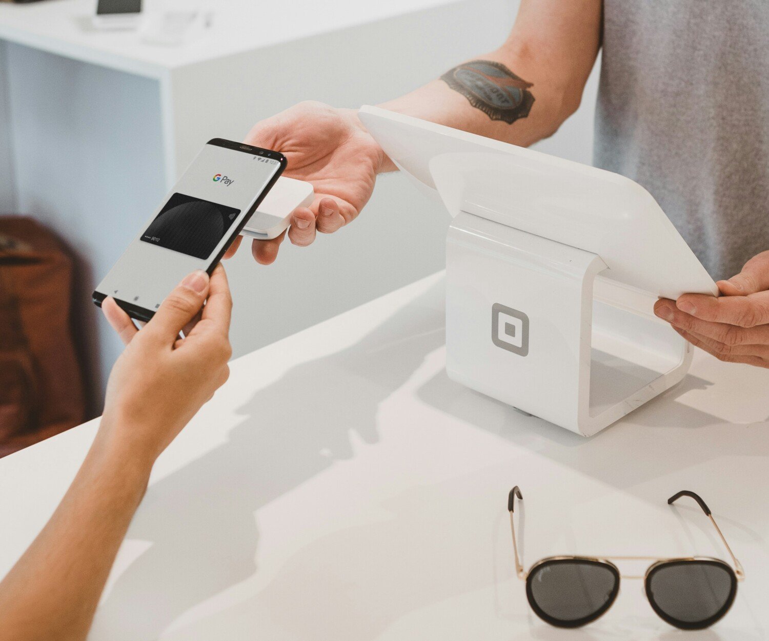 person holding black Android smartphone close-up photography